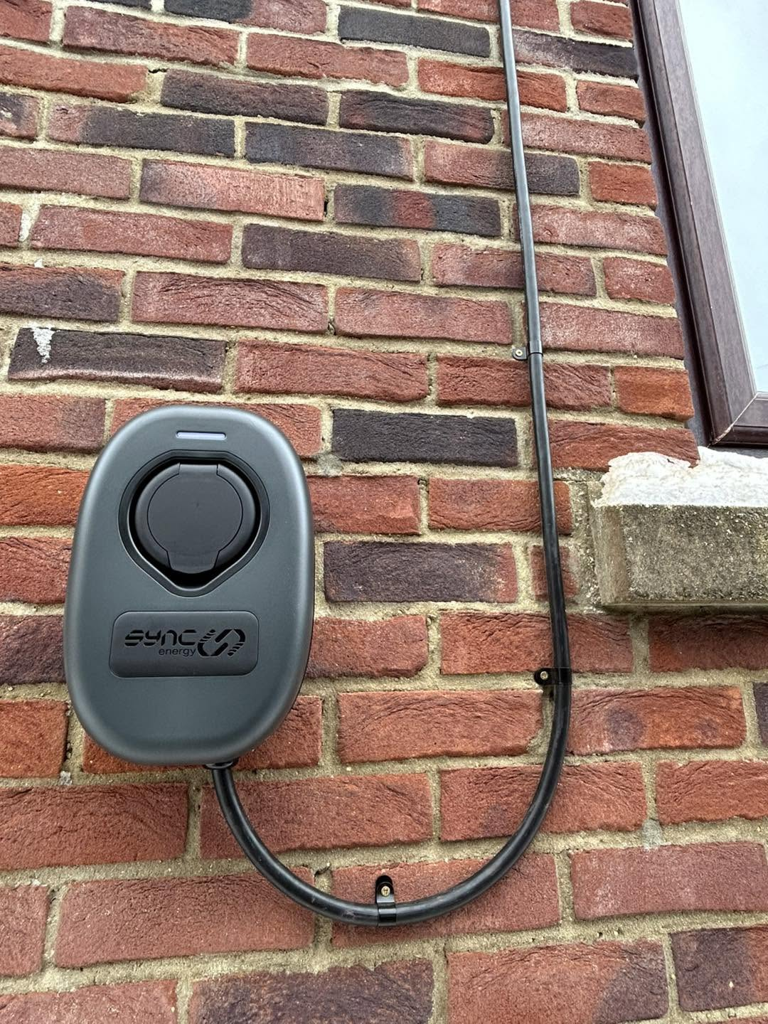 Wall-mounted EV charger installation